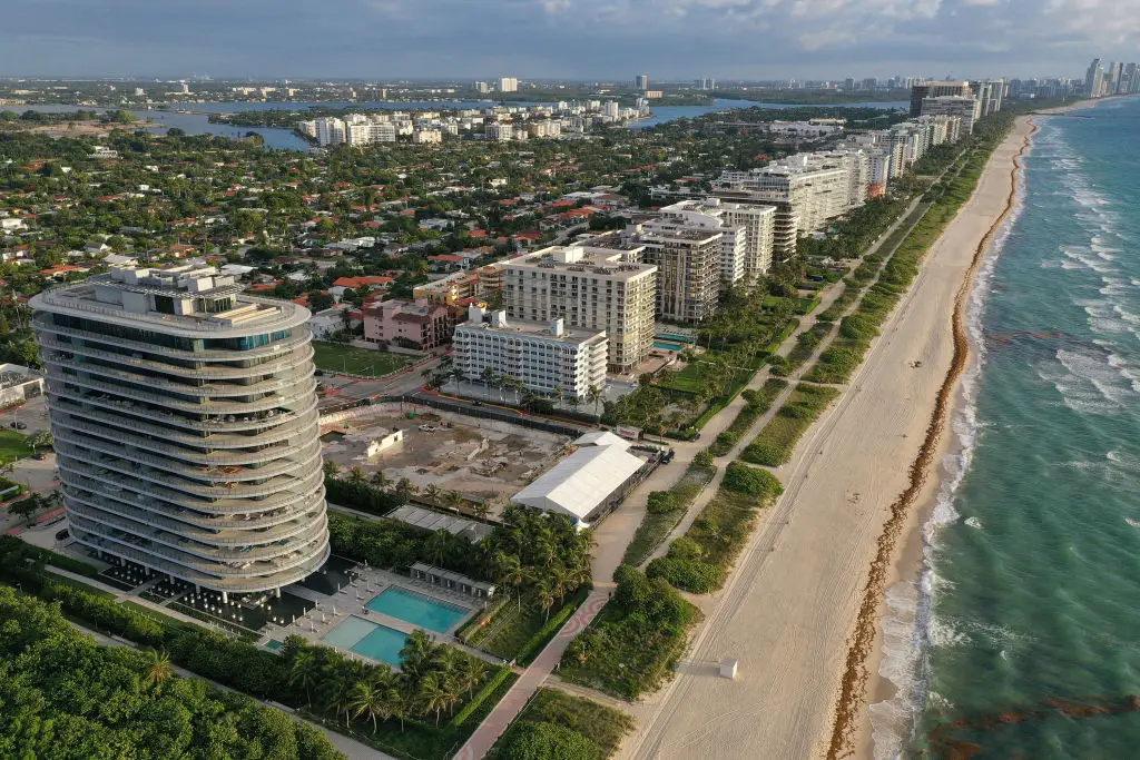 Surfside, Florida - pictured in 2022 on the first anniversary of the tragic collapse of the 12-story Champlain Towers South condo building when 98 people died (Joe Raedle/Getty Images)