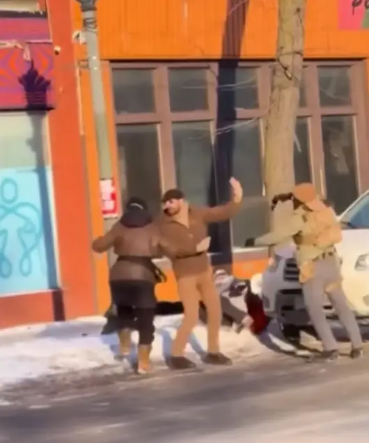 Pretti appeared to be trying to help a woman who was confronted by federal agents (NBC News)