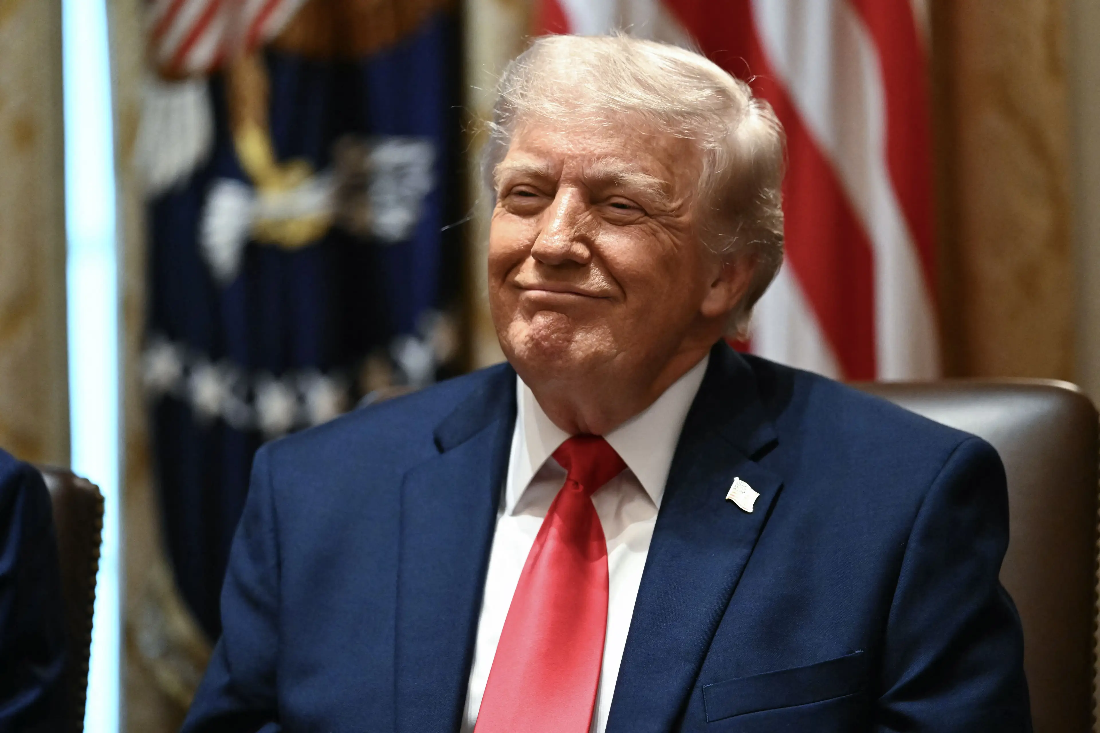 President Trump said he would be in attendance (Kent NISHIMURA / AFP via Getty Images)