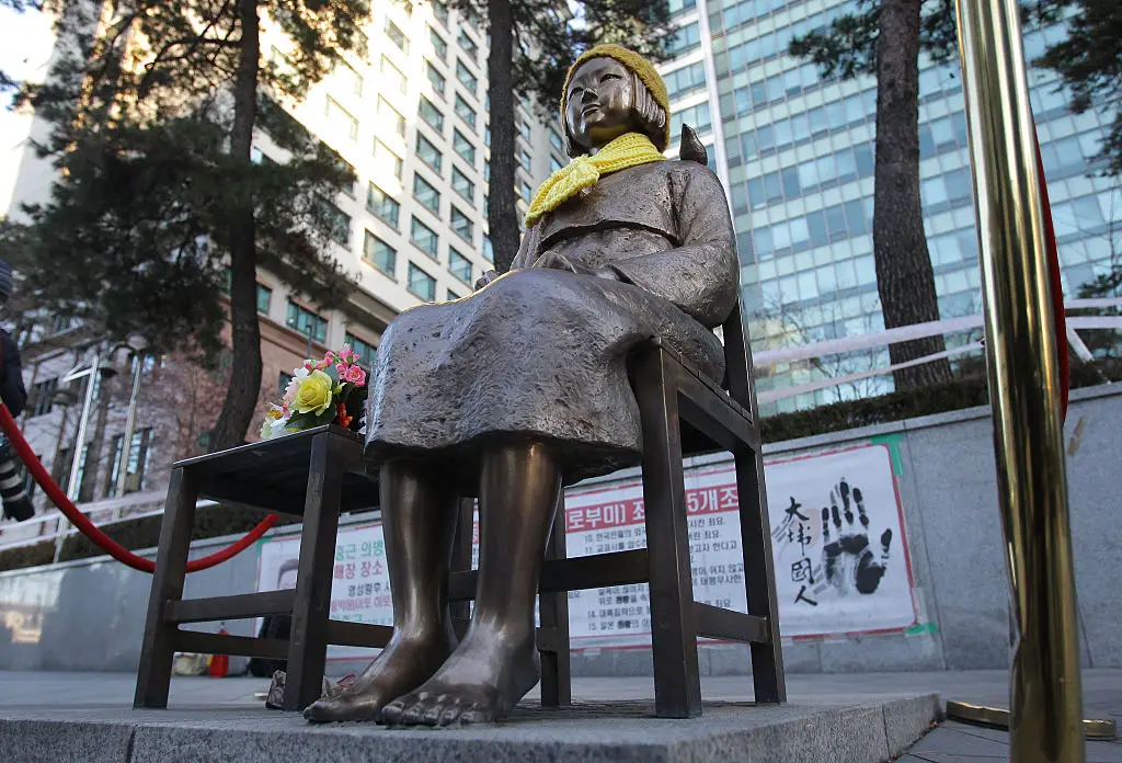 A 'comfort women' statue in front of the Japanese Embassy in Seoul, South Korea, in 2015 (Chung Sung-Jun/Getty Images)