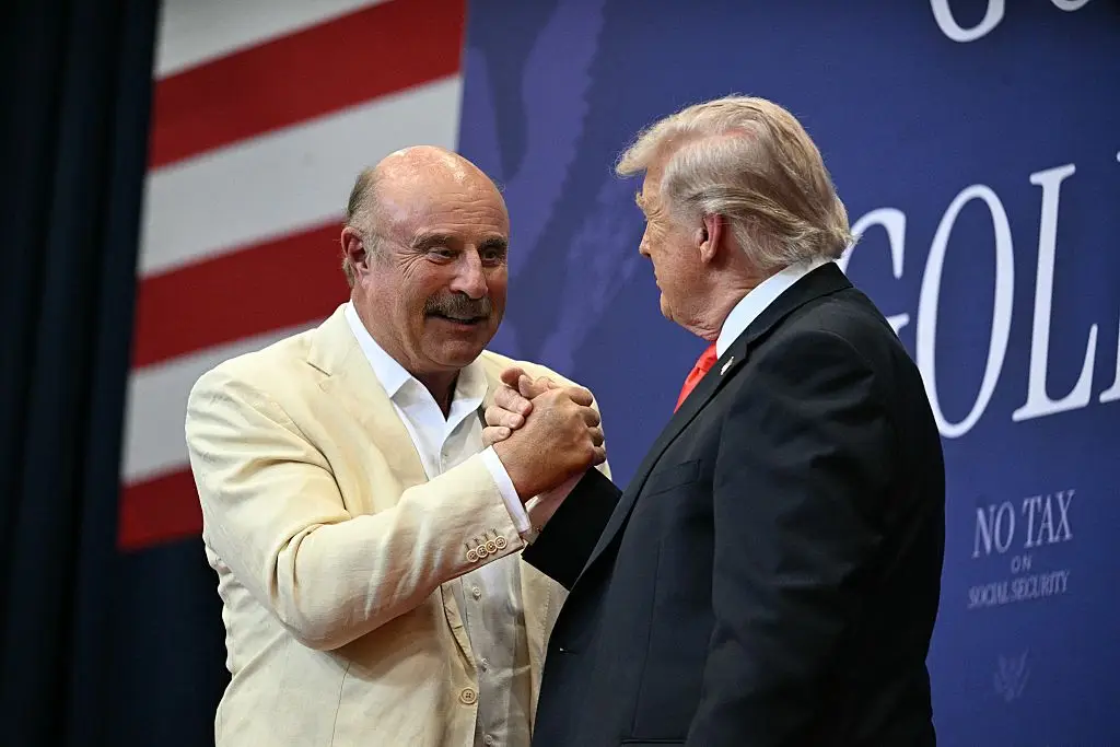 Dr. Phil claims the Trump administration brought him in to privately review government files on UFOs before they were released to the public. (Photo by Jim WATSON / AFP via Getty Images)