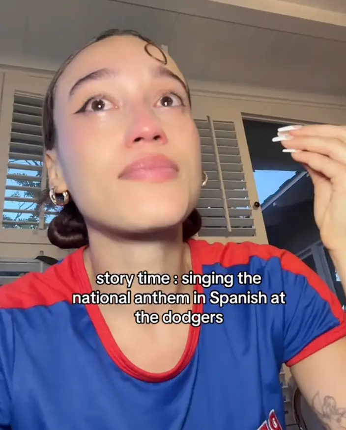 Nezza claims she found herself in hot water for singing the national anthem in Spanish (TikTok/@babynezza)