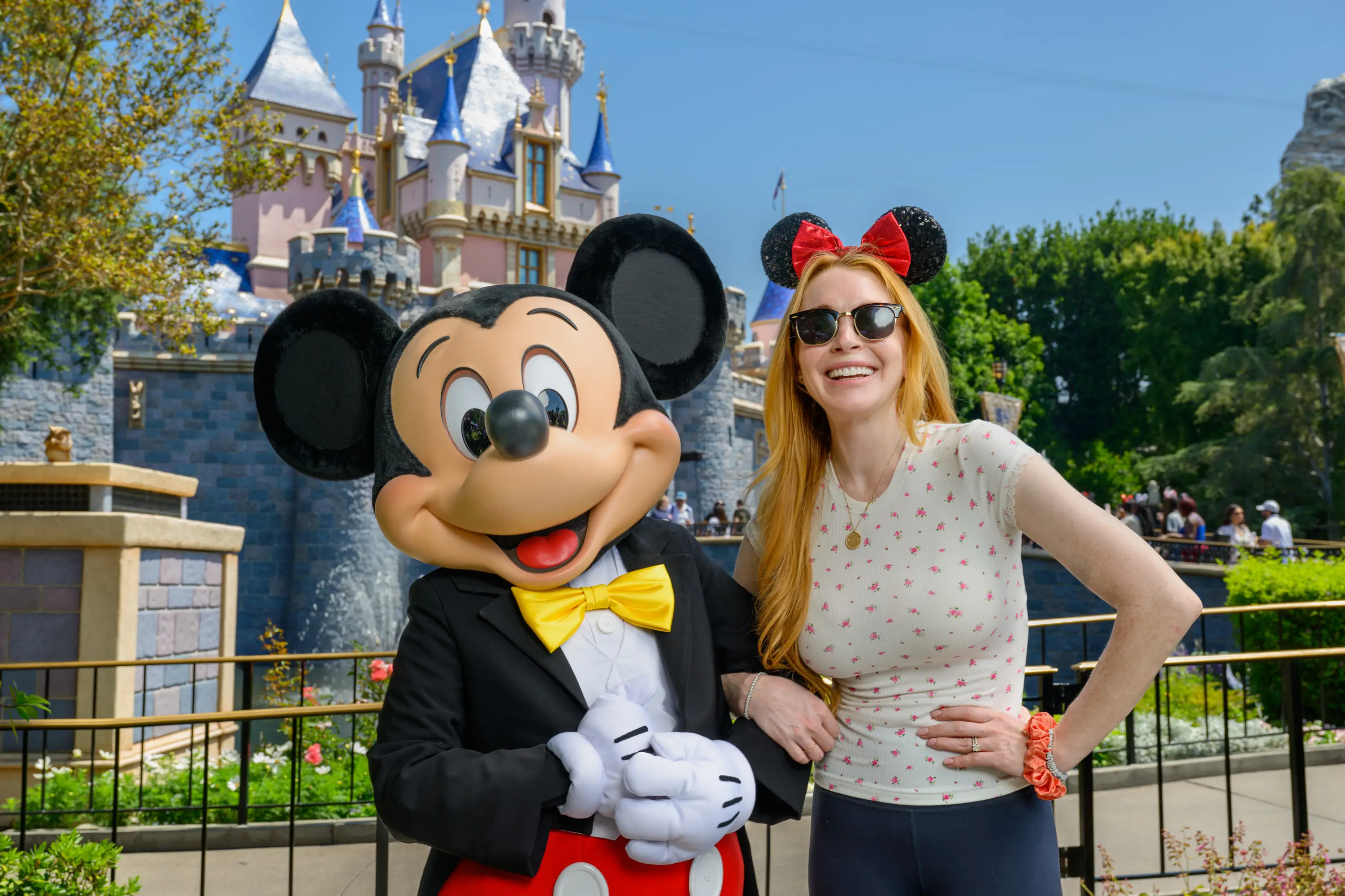 Lindsay Lohan with Mickey at Disneyland (Richard Harbaugh/Disneyland Resort via Getty Images)