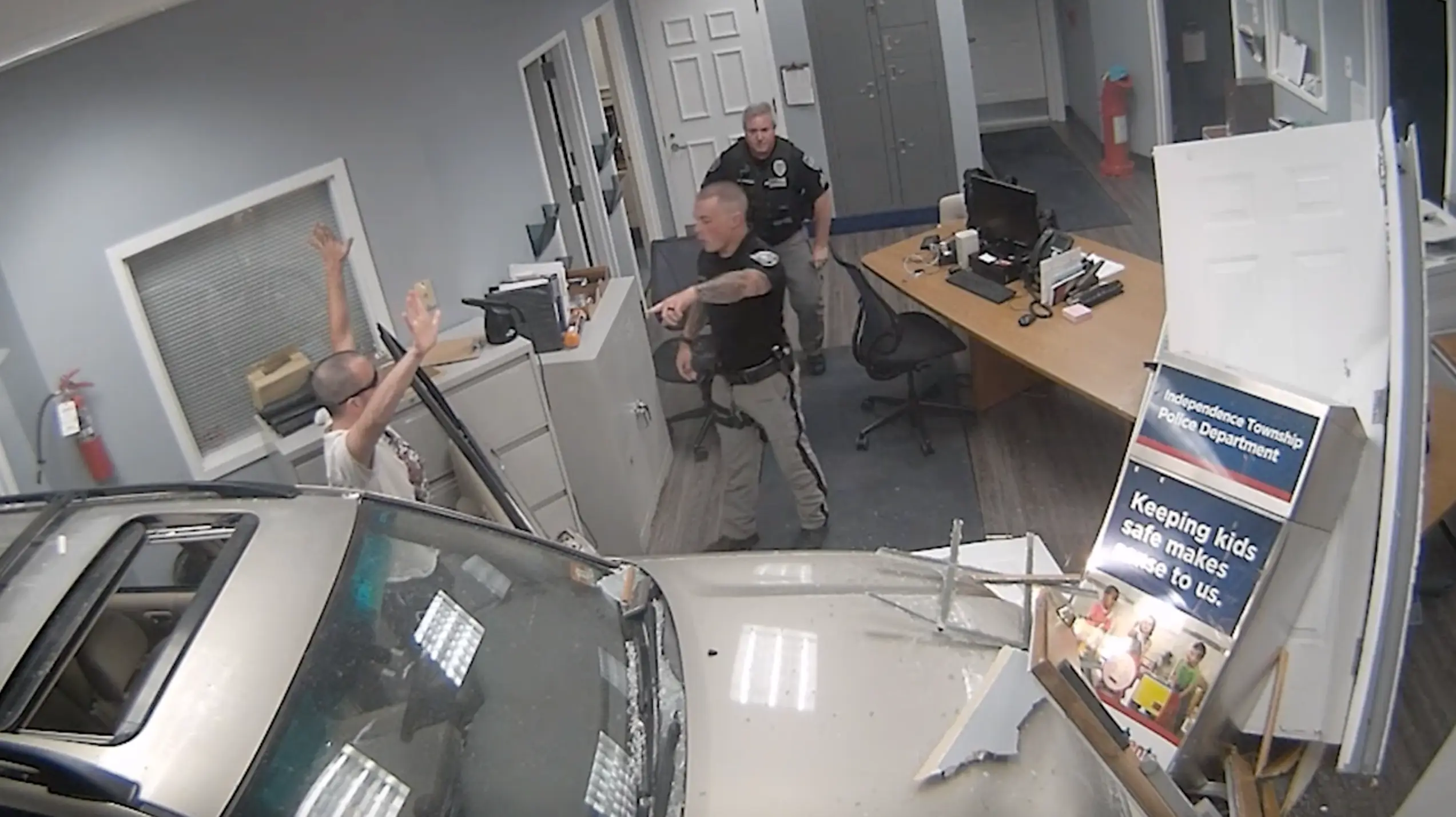 The 34-year-old appeared to celebrate before being apprehended by officers.