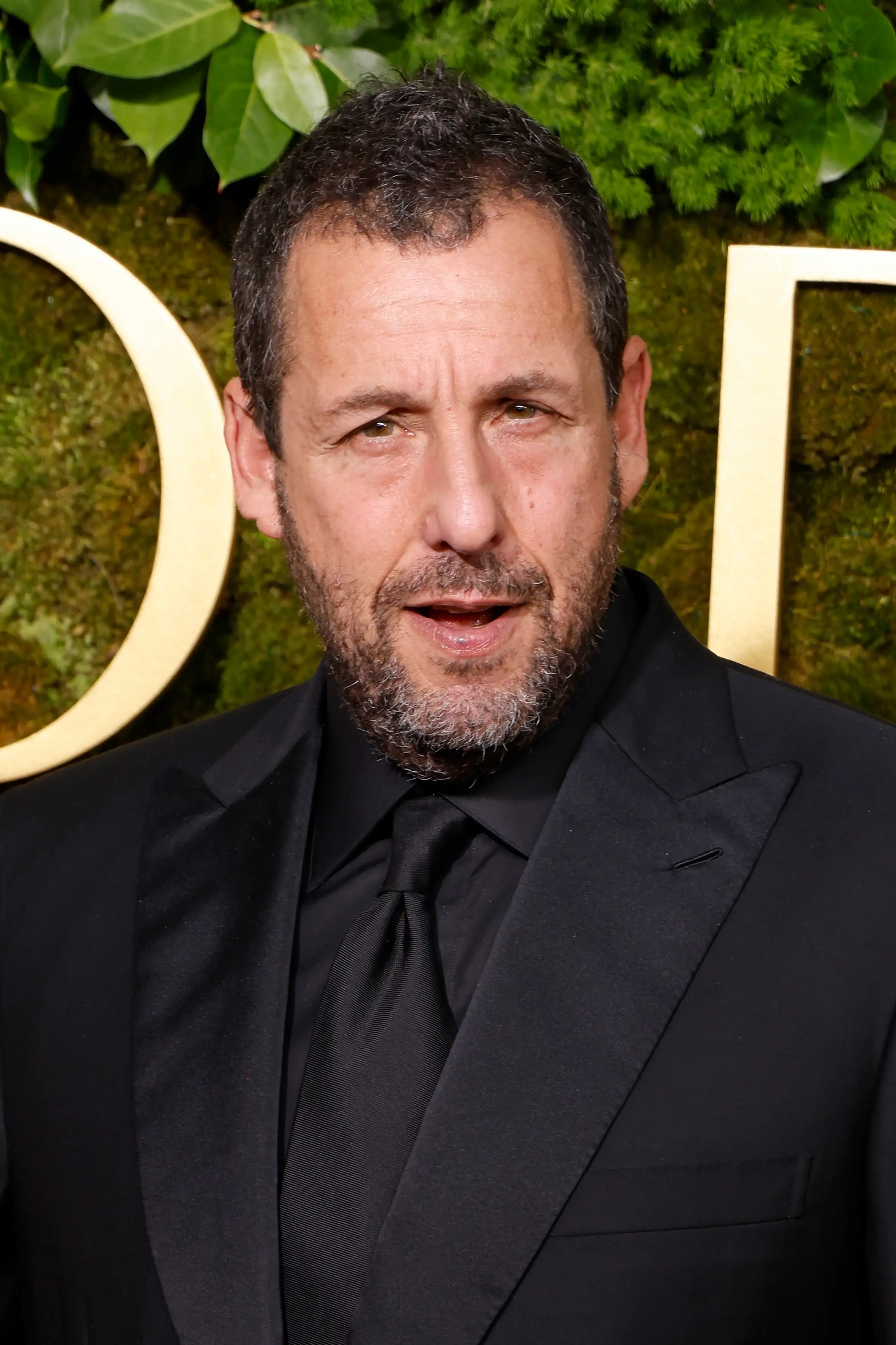 Happy Gilmore star Adam Sandler officiated the ceremony, Swift's publicist confirmed ( Taylor Hill/FilmMagic)