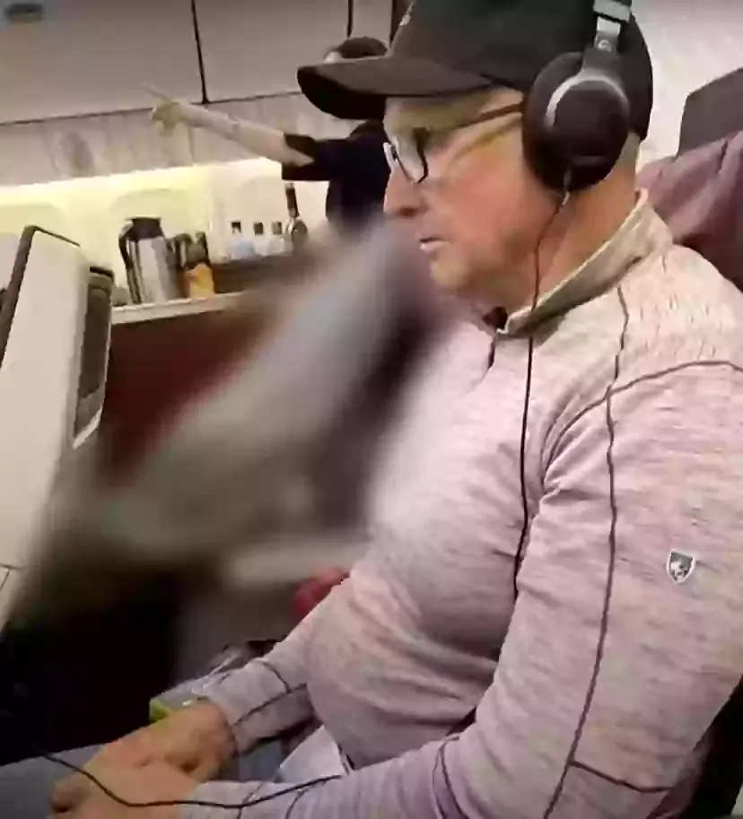 Mitchell Ring said he sat next to the passenger who had died on the flight (YouTube/A Current Affair)