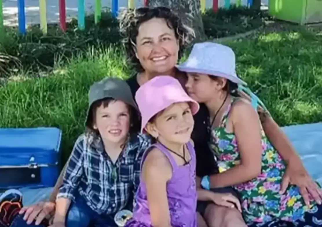 Cat with her three children (YouTube/New Zealand Herald)