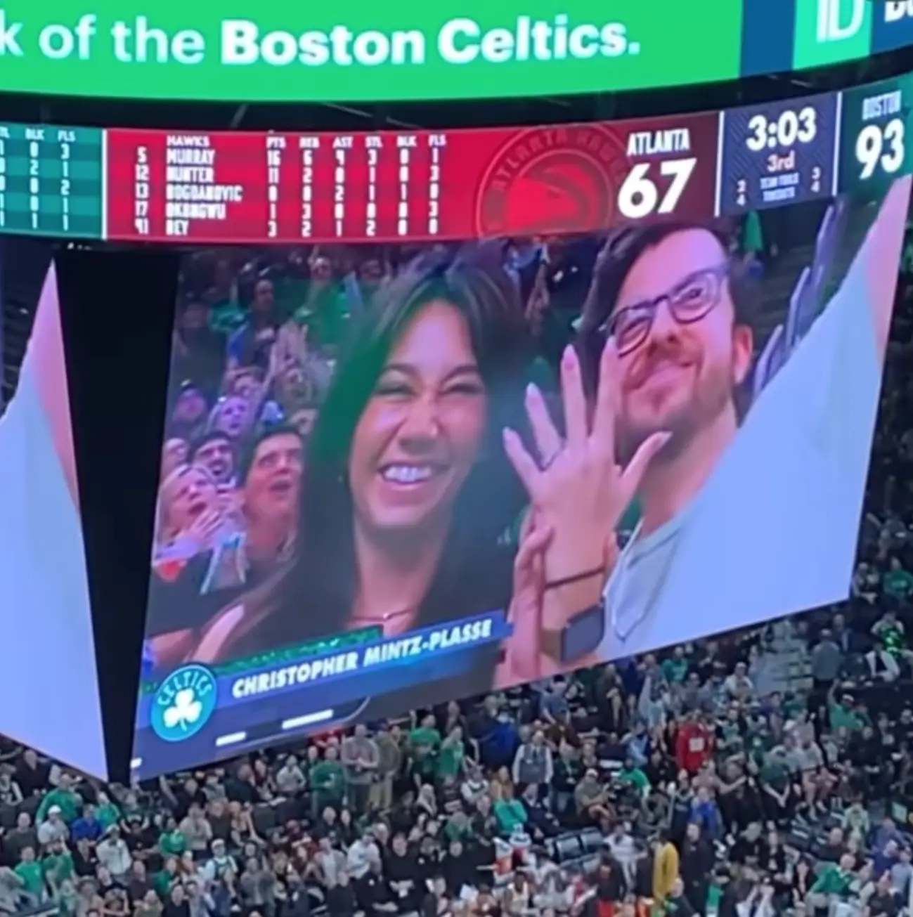 The couple were shown on the jumbotron during the game.