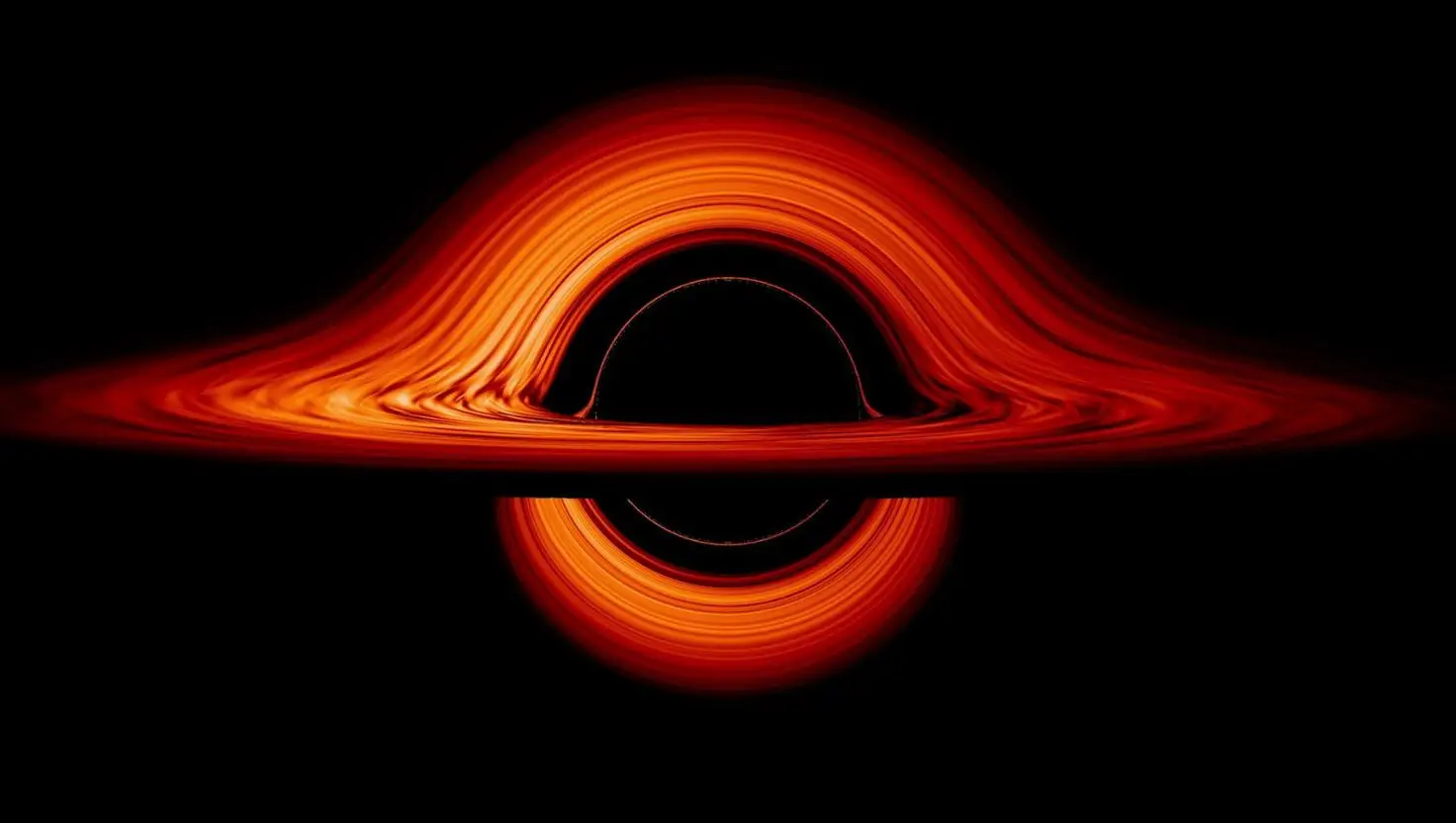 Gravity sits below the surface of black holes because they are so dense (Nasa’s Goddard Space Flight Center/Jeremy Schnittman)