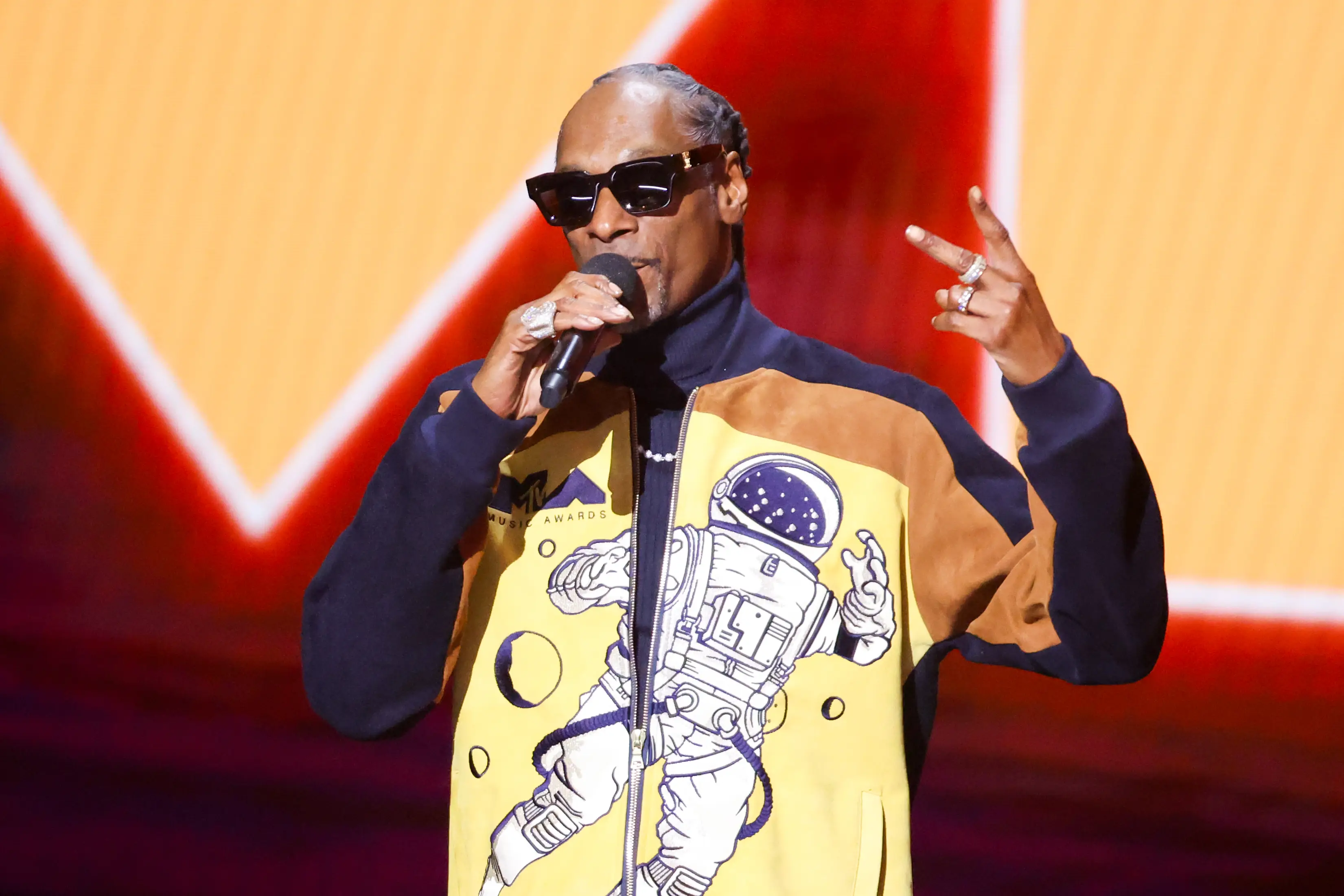 The broadcast eventually resumed, with Snoop Dogg leading the show (Rich Polk/Billboard via Getty Images)
