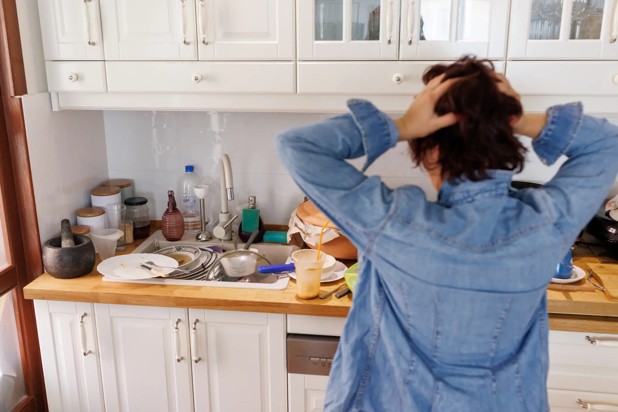 Women in heterosexual relationships report higher feelings of discontent if their partner doesn't help out with the dishes (Getty Images)