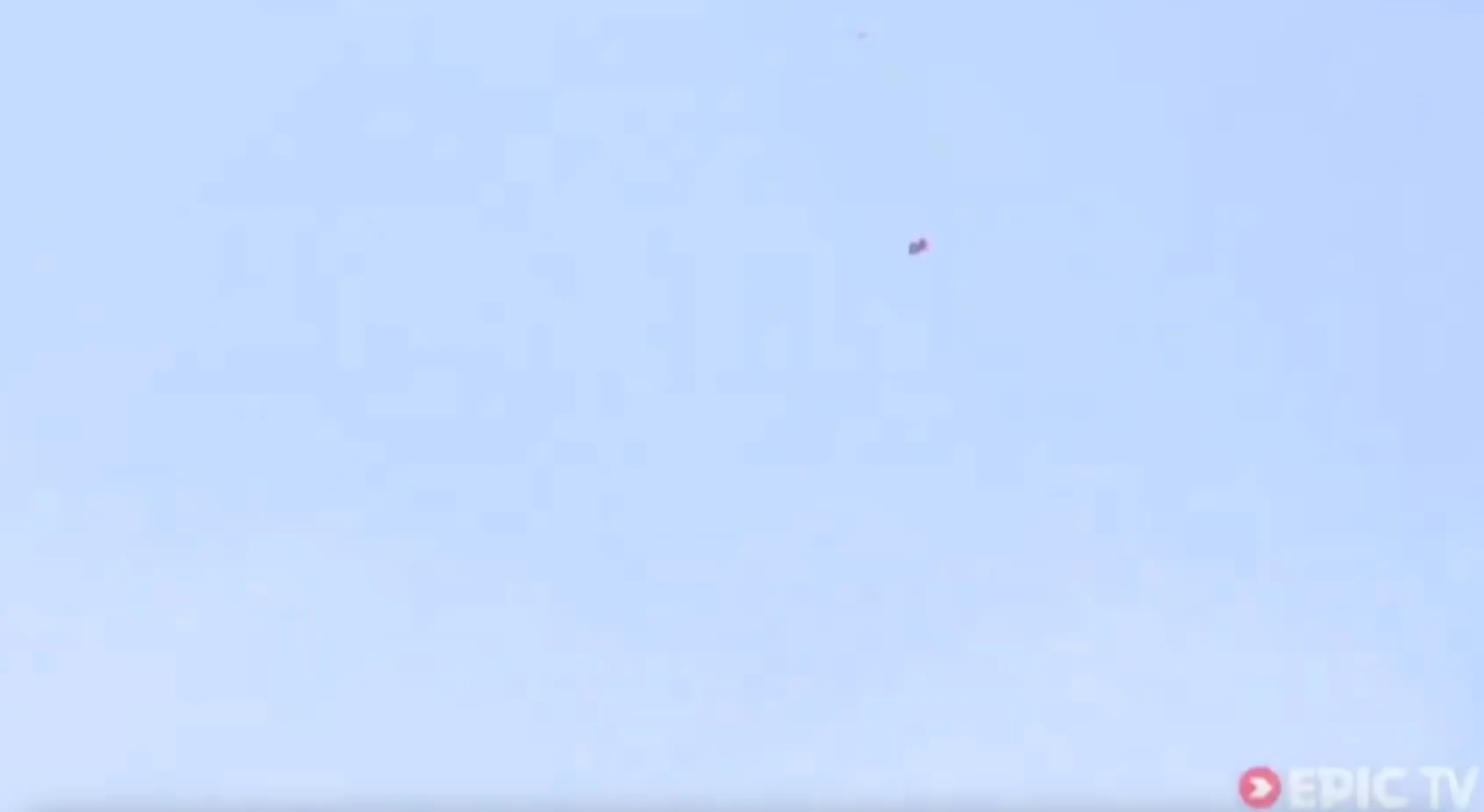 Mark Sutton is pictured flying through the sky above Switzerland. (Epic TV)