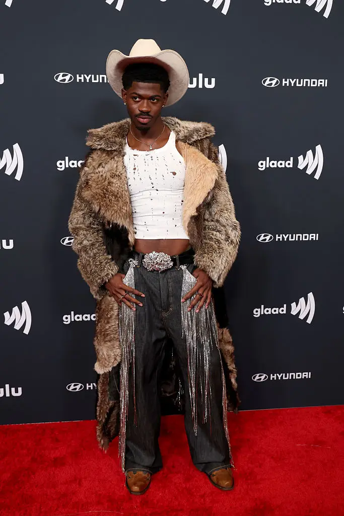 Lil Nas X has been charged with four felonies after he was allegedly caught wandering the streets of LA naked (Frazer Harrison/Getty Images)