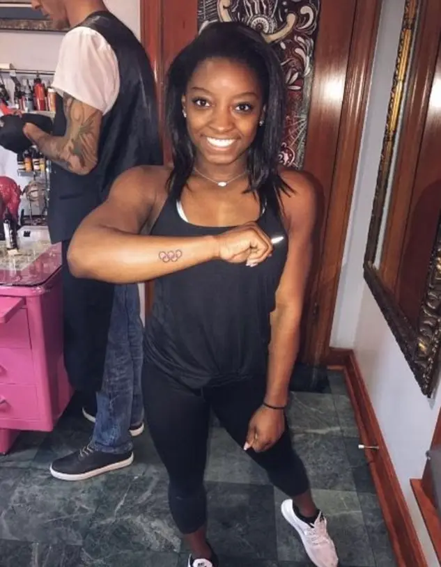 All-around gymnastics champion Simone Biles with her Olympic tattoo. (Instagram/@simonebiles)