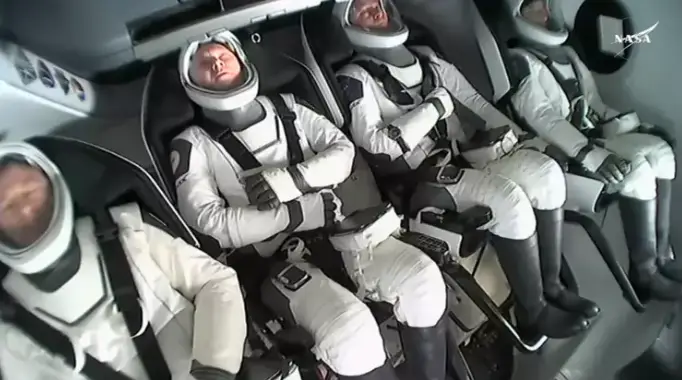 Astronauts bracing as they land on planet Earth from the ISS (NASA)