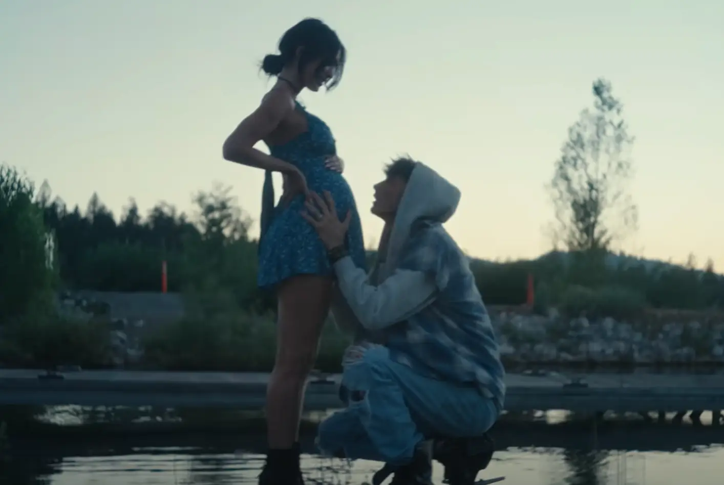 Fox appeared with a baby bump in the music video (YouTube/ MGK) 