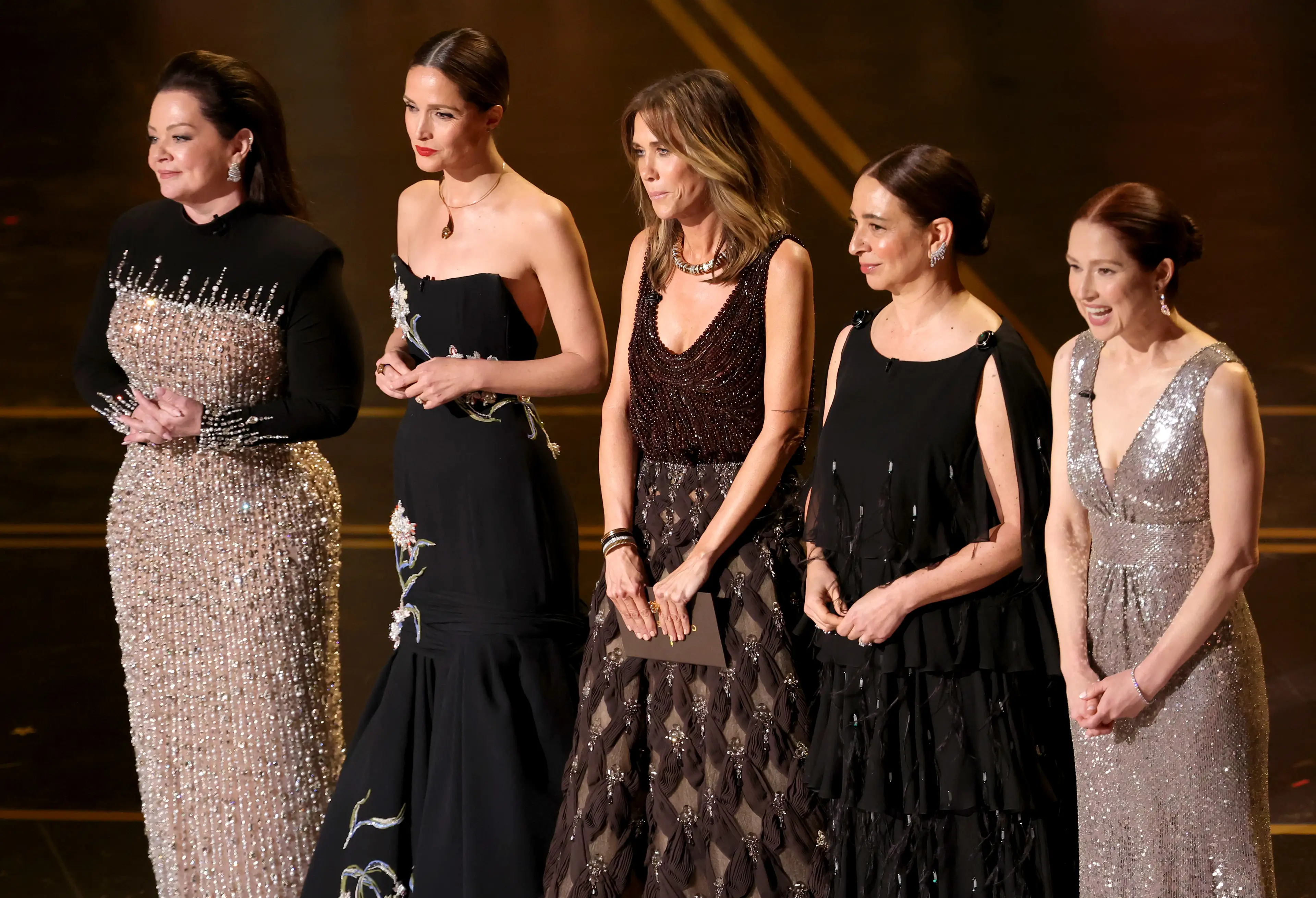 Several members of the Bridesmaids cast reunited on stage at the Oscars (Kevin Winter/Getty Images)