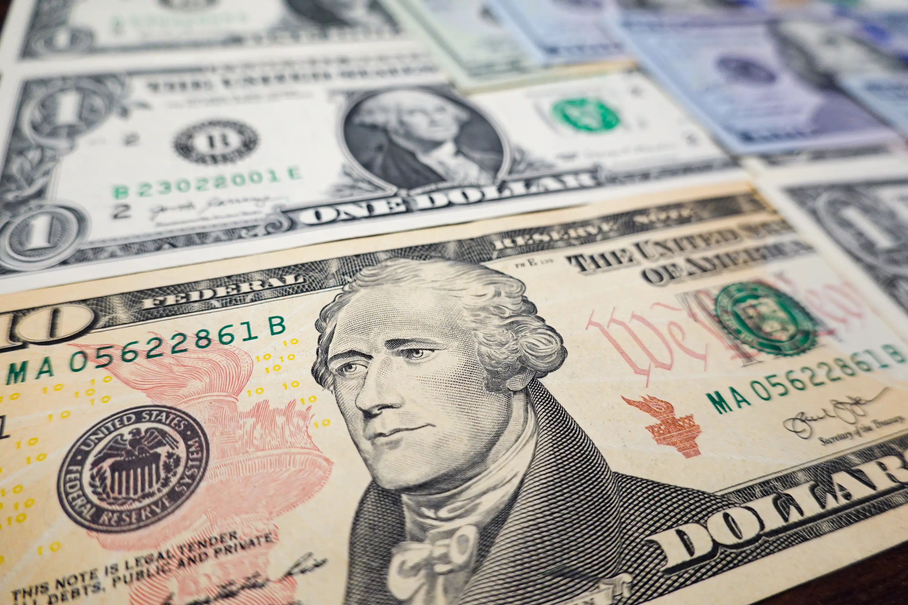 A $10 bill weighs around 1g, and you would need just over 110 US tons of them to have $1 trillion (Illustration by Sheldon Cooper/SOPA Images/LightRocket via Getty Images)