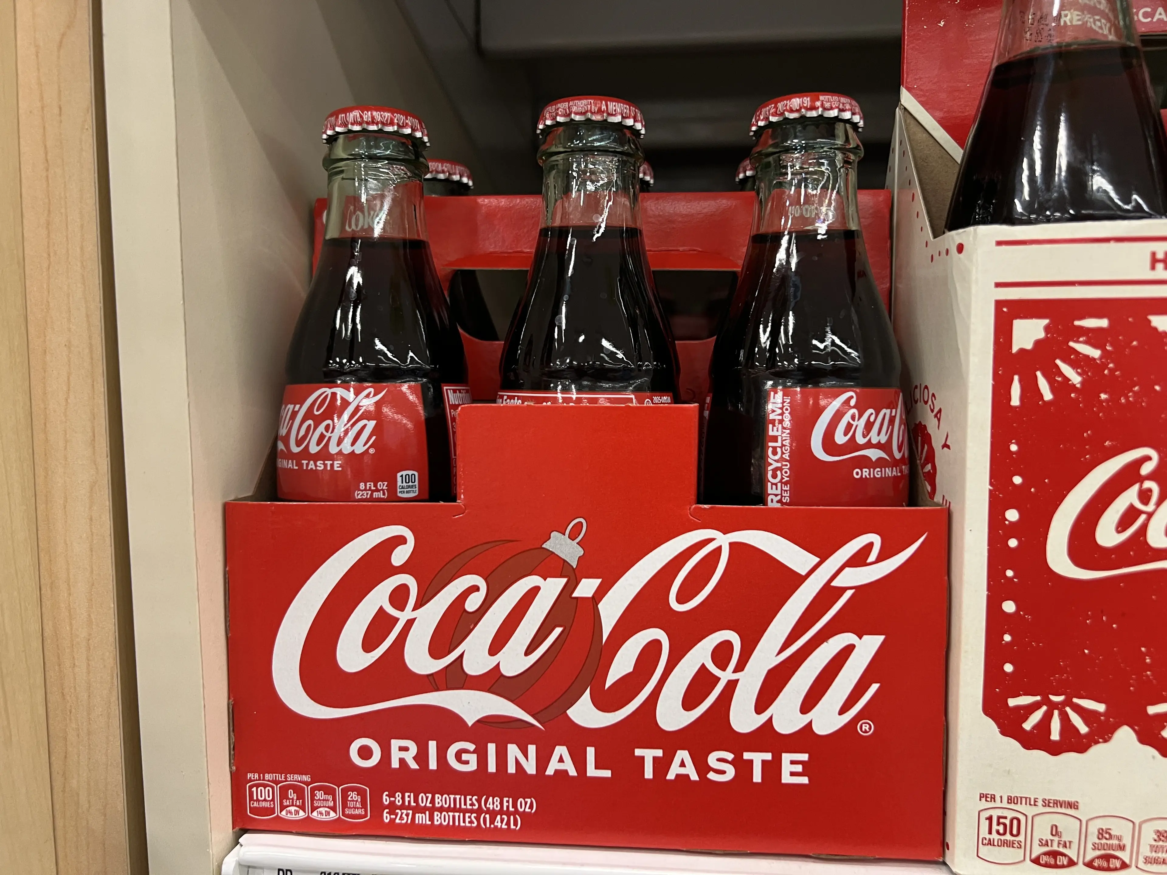 Most Coke bottles have a red cap (Smith Collection/Gado/Getty Images)