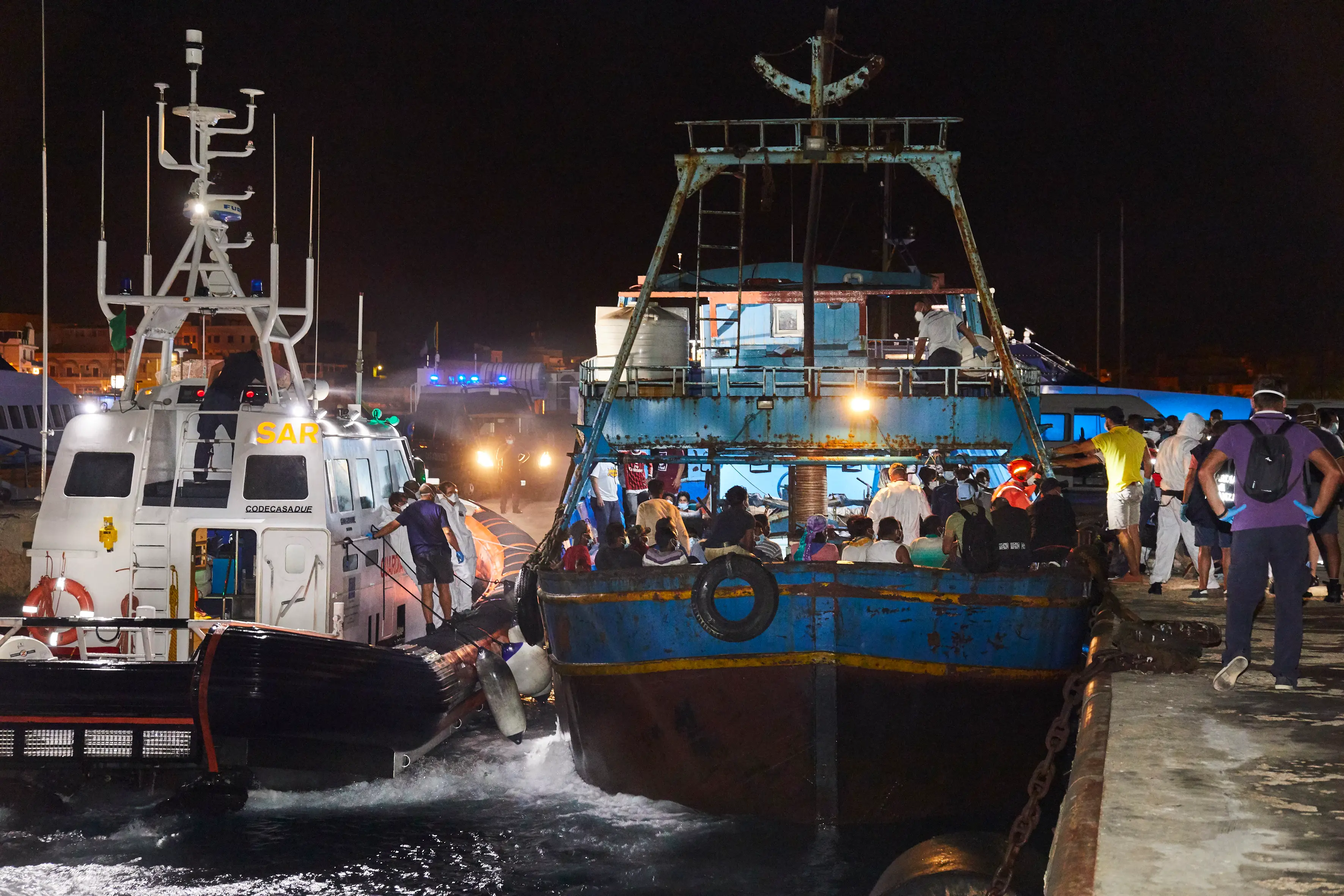 A large fishing ship arrives from Libya in Lampedusa.
