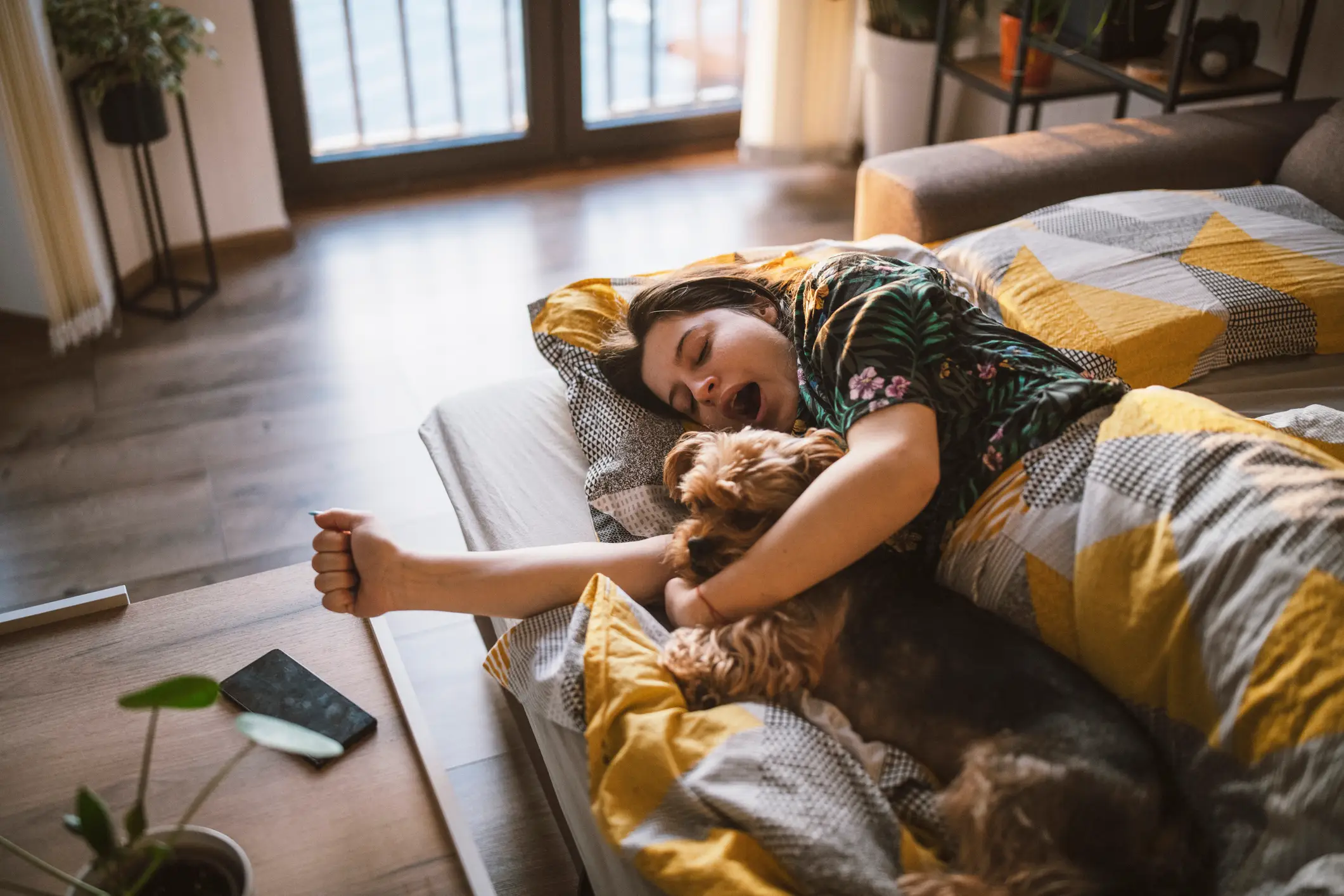 Try and not reach for your phone first thing in the morning, a neuroscientist says (Getty Stock Images)