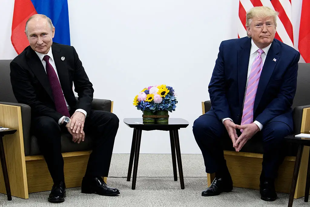 Vladimir Putin and Donald Trump will sit down together on Friday (BRENDAN SMIALOWSKI/AFP via Getty Images)