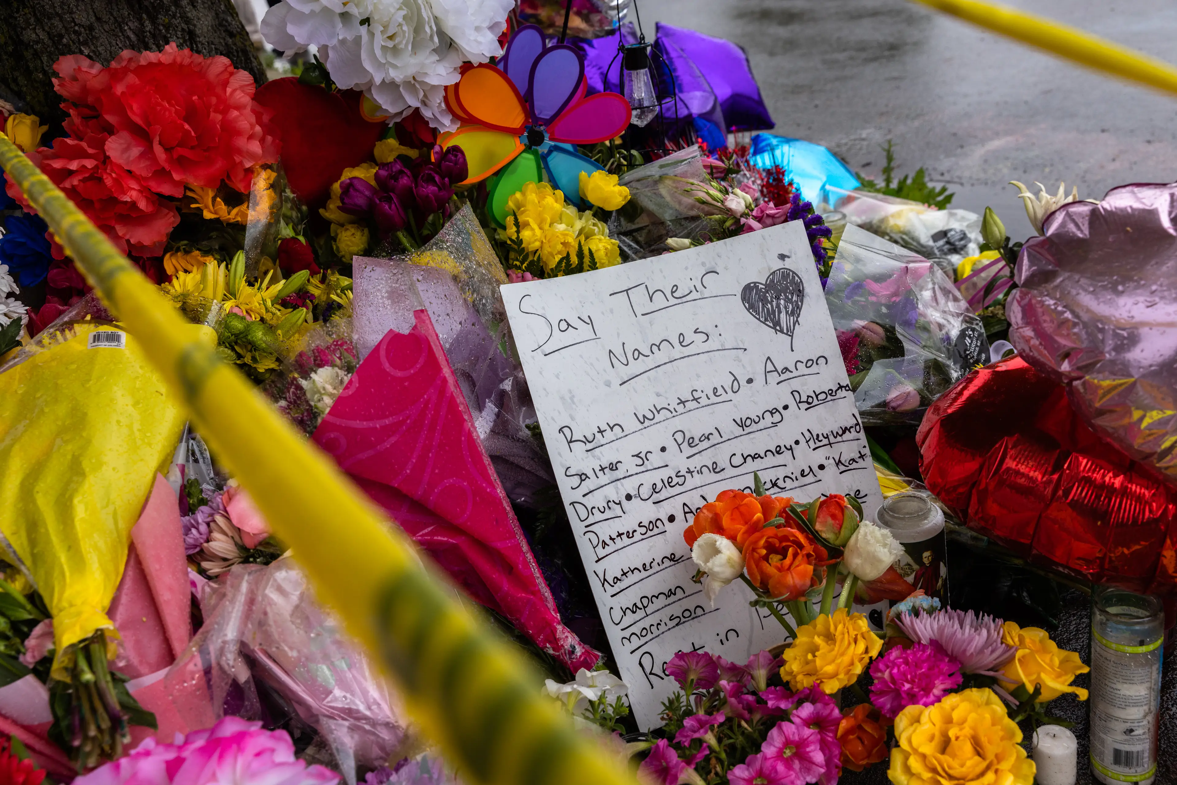 A memorial lists the names of those killed in the terrorist attack (Matt Burkhartt for The Washington Post via Getty Images)