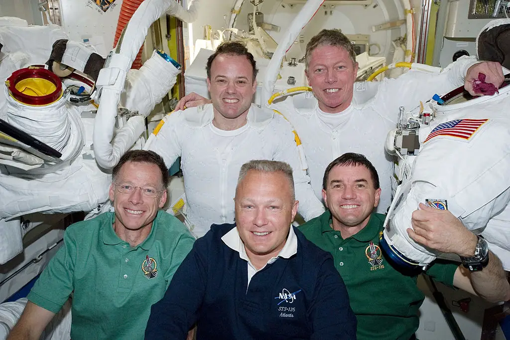 Ron Garan (pictured here in 2011 at the top left) has spent almost six months in space (NASA via Getty Images)
