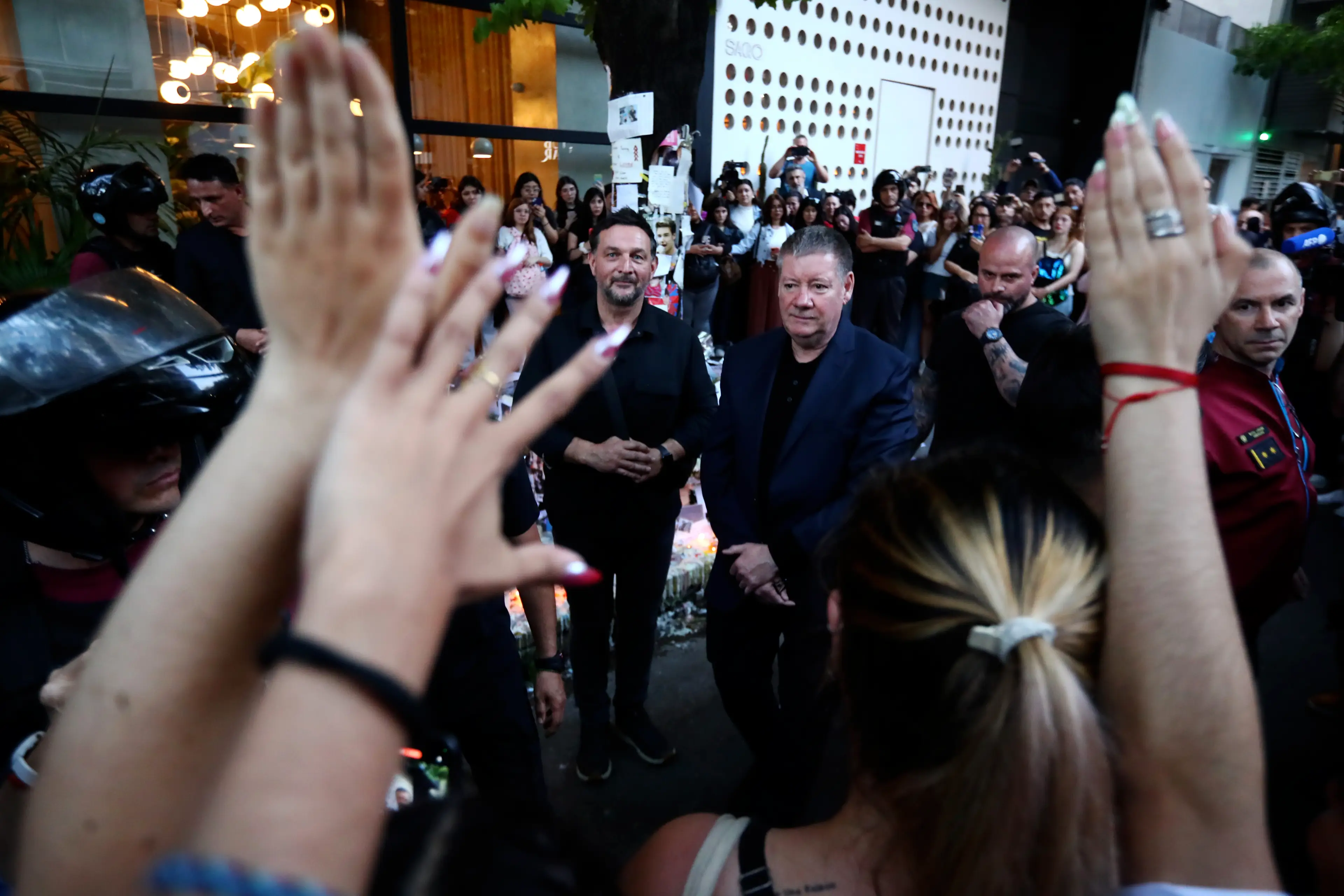 This was the best picture paparazzi got of Geoff Payne as he entered the hotel (Marcos Brindicci/Getty Images)