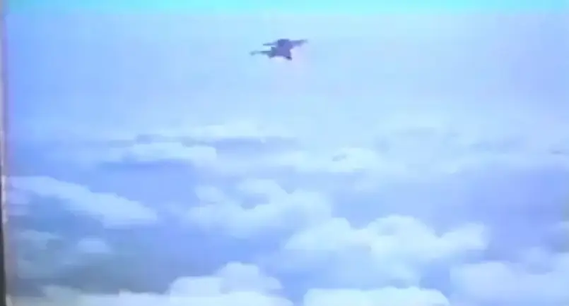 The skydiver jumped out of the plane to record a student and instructor.