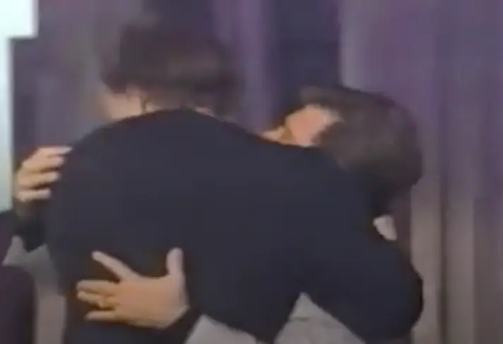 Isaak wiped his mouth after Carrey embraced him (MTV)