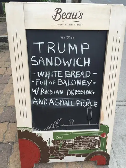 The hilarious A-board was spotted outside a cafe in Canada back in 2016 - during Trump's first term (X/@cheng_christine)