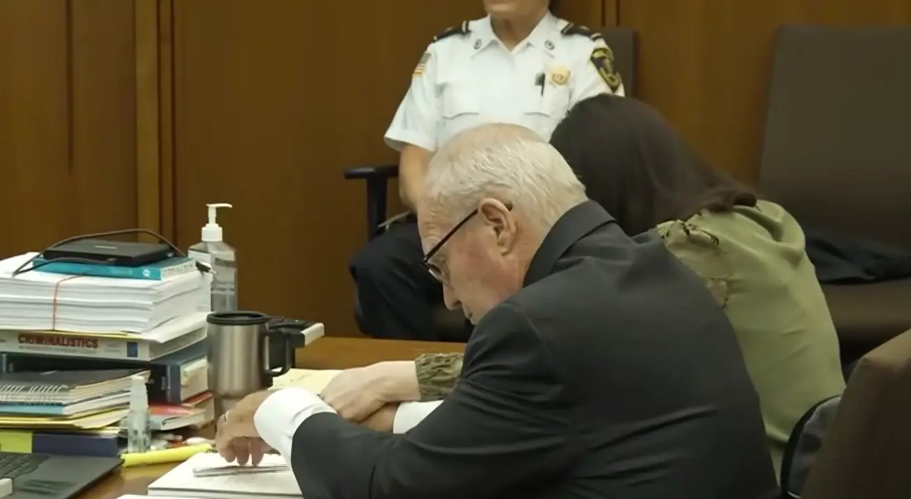 Lindsay was seen visibly clutching her attorney's hand at one point (Court TV)