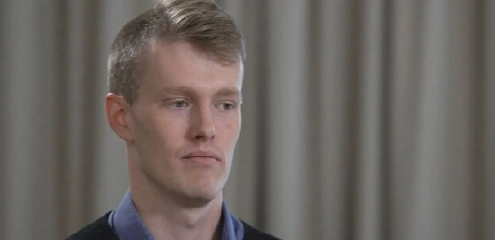 Sam Boon is suing the university.