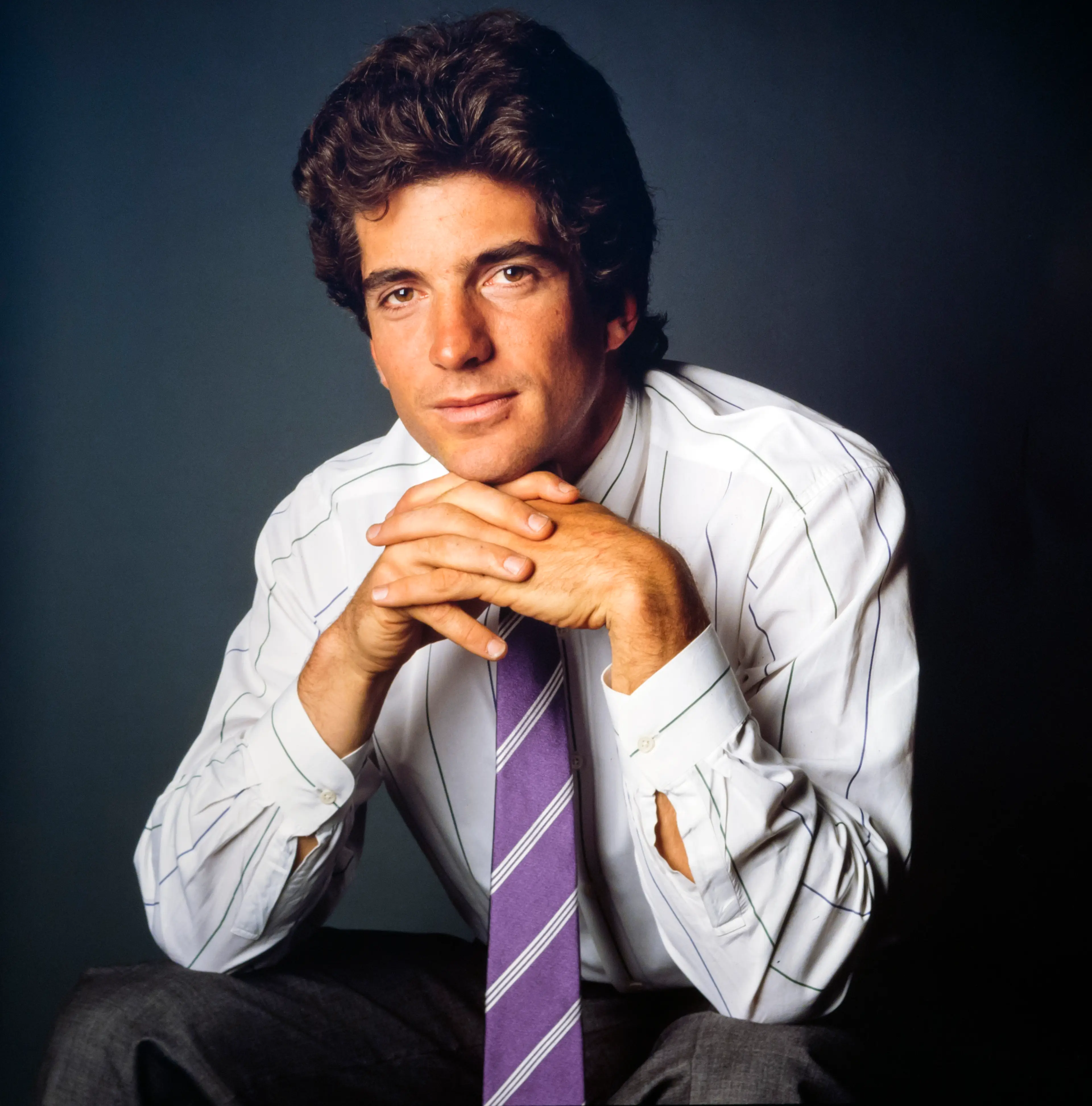 Many QAnoners believe that 'Q' is the late John F. Kennedy Jr (Brownie Harris/Corbis via Getty Images)