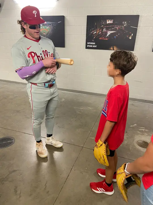 Bader gifted the boy a signed bat after the match (