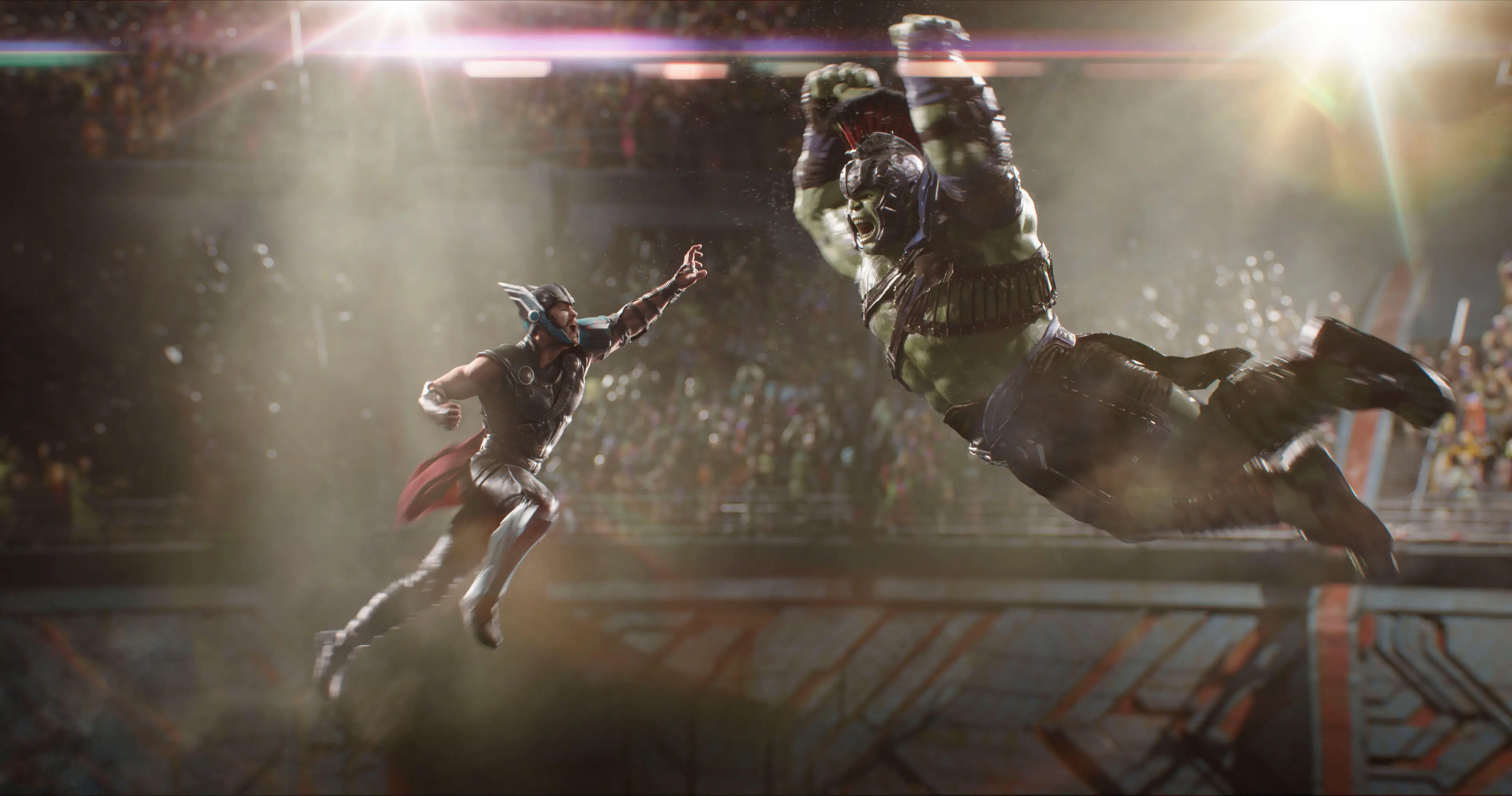 Chris Hemsworth as Thor, fighting Mark Ruffalo's The Hulk.