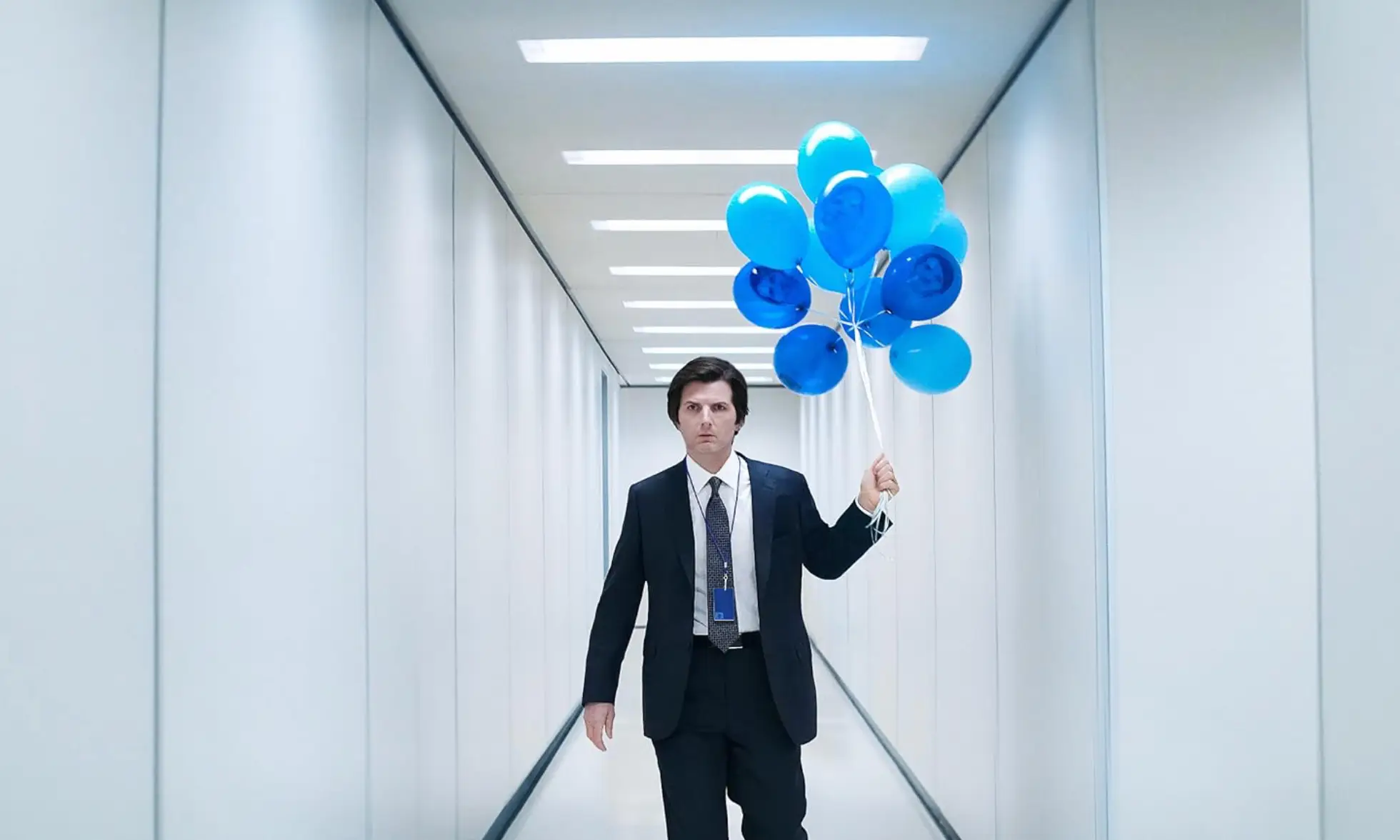 Adam Scott plays the main character Mark, alongside Britt Lower who plays Helly. (Apple TV+)