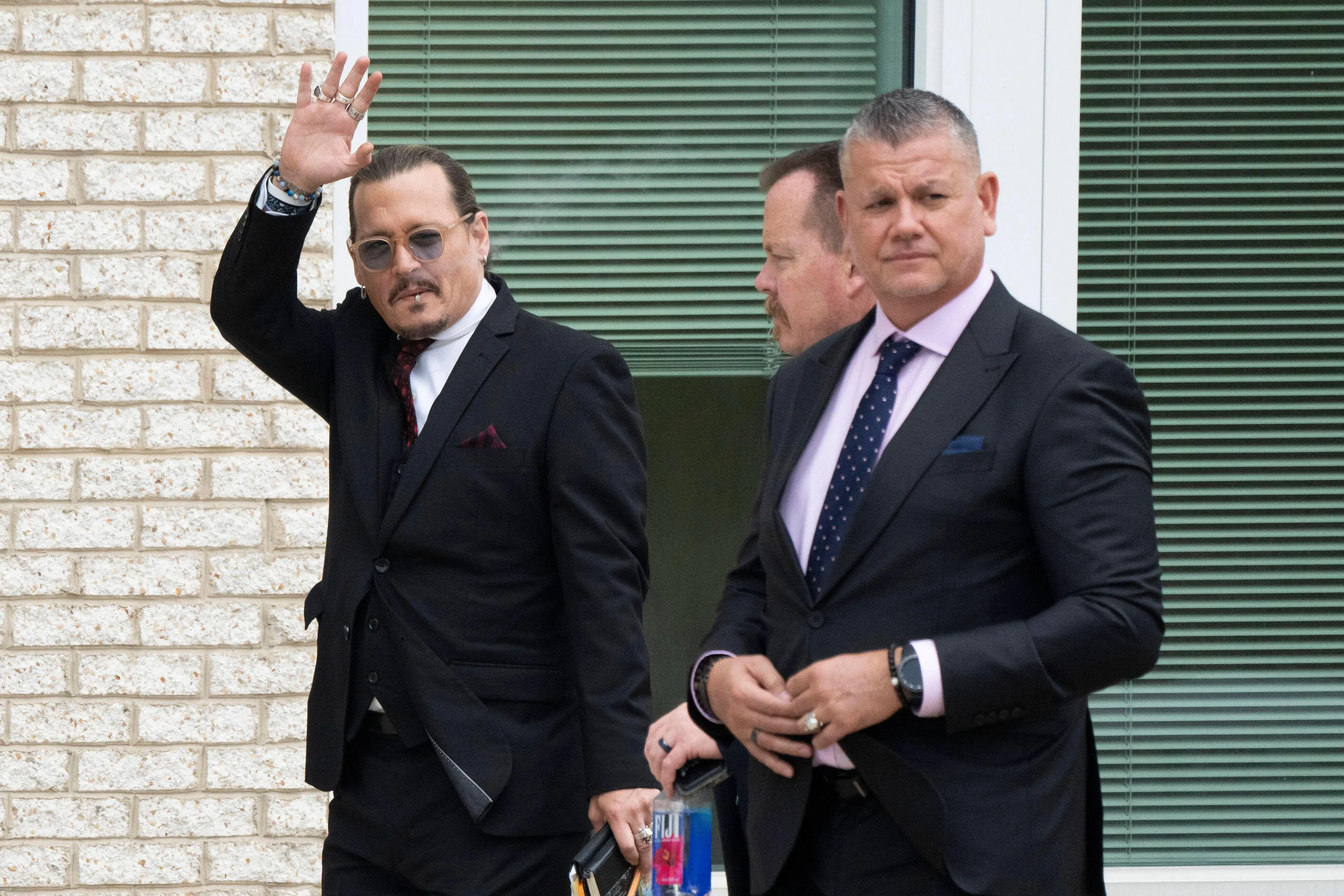 Depp denies being abusive to his ex-wife, Amber Heard.