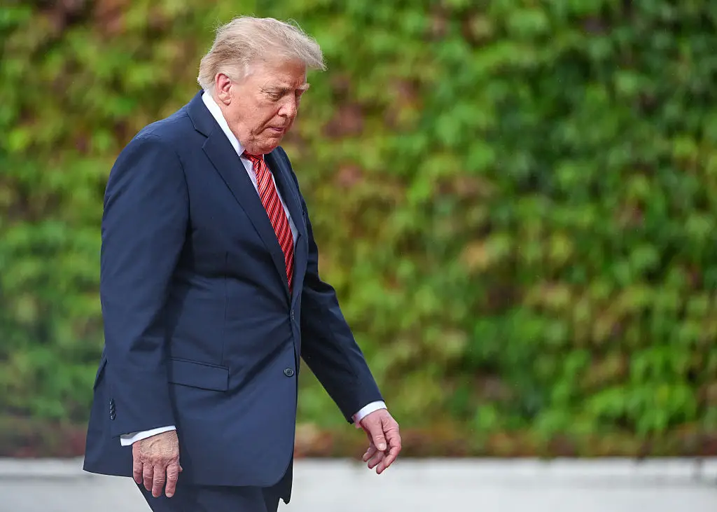 President Donald Trump has dismissed unfavorable polling as "fake" on Truth Social. (Photo by Artur Widak/NurPhoto via Getty Images)