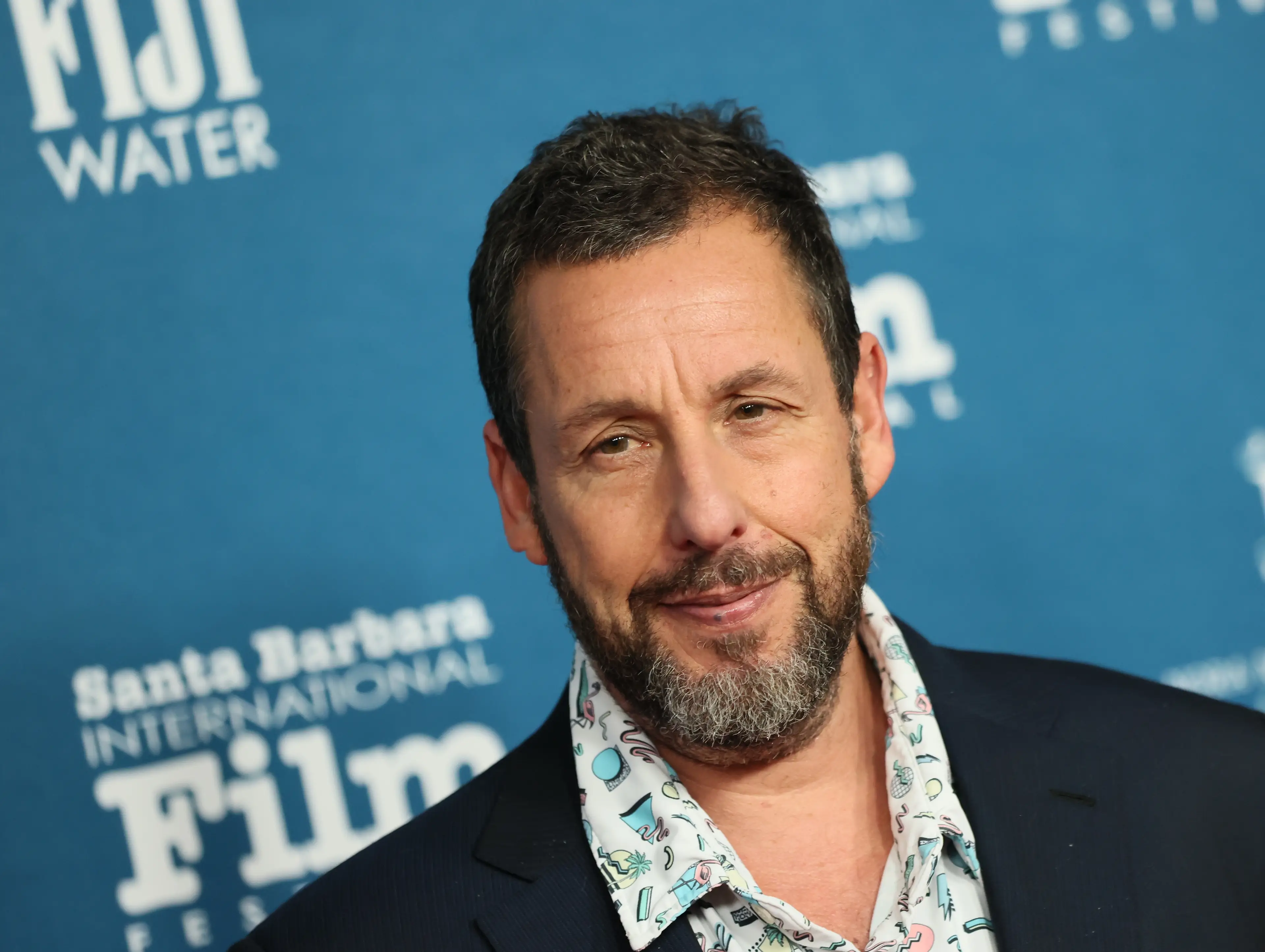 Adam Sandler, long time friend of Travis Kelce officiated the wedding (Photo by JB Lacroix/WireImage)