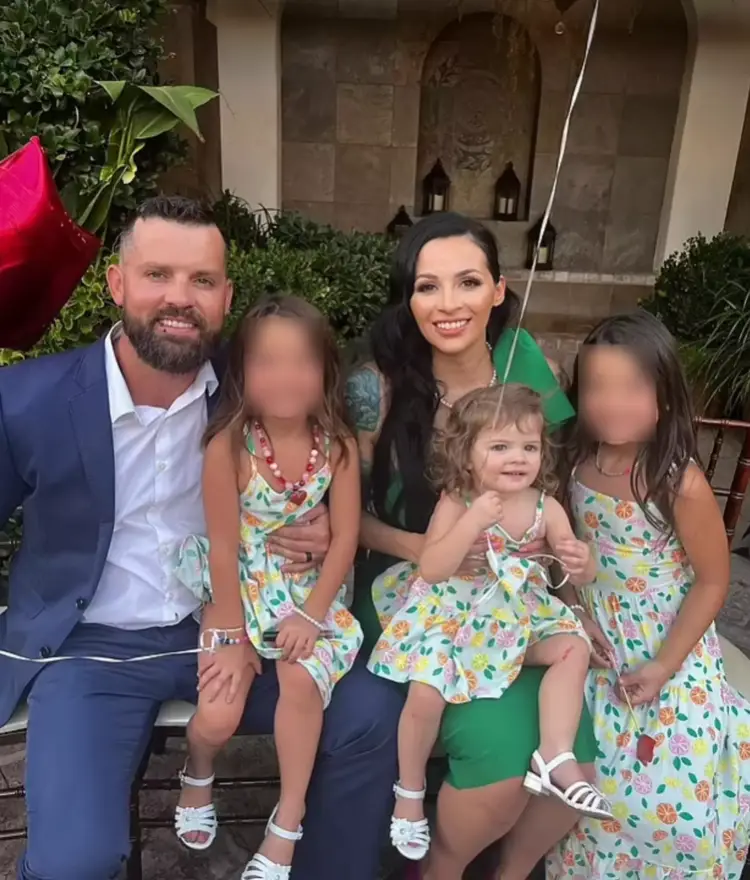 Erika and Christopher Scholtes pictured with Parker and their other two daughters. (Instagram)