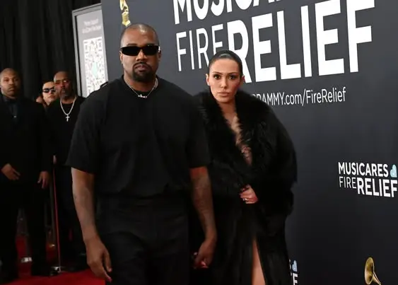 While Bianca wore almost nothing underneath her coat, Kanye sported an all-black outfit (Jon Kopaloff/WireImage)