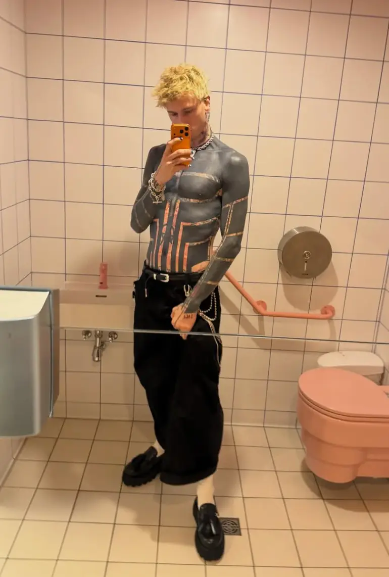 The rapper shared a few pictures of his own, including a topless selfie (Instagram/@machinegunkelly)