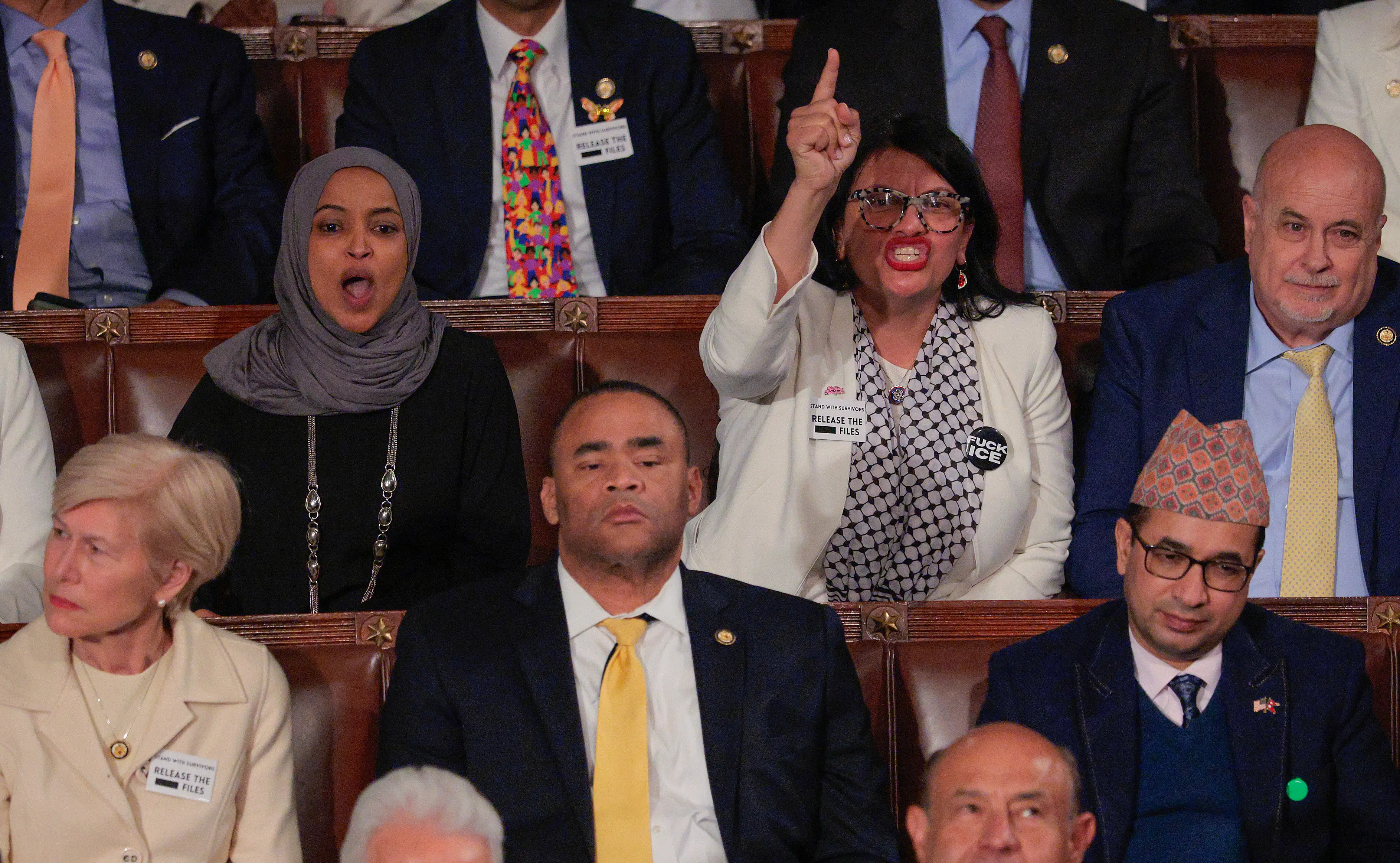 Rep. Ilhan Omar (D-MN) (L) and Rep. Rashida Tlaib (D-MI) heckled Trump during Tuesday's State of the Union address (Chip Somodevilla/Getty Images)