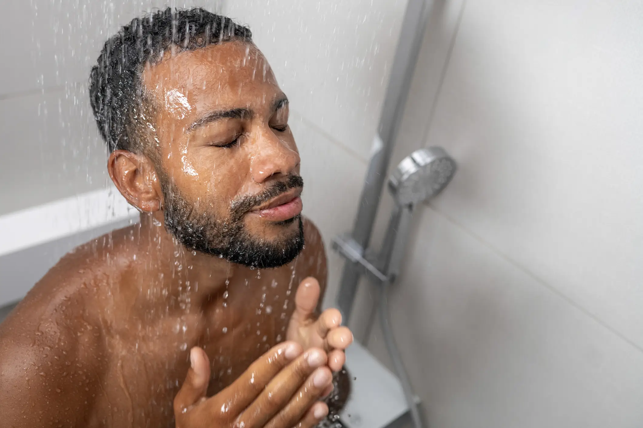 Two in three Americans have admitted to the controversial shower habit (Getty Stock Image)