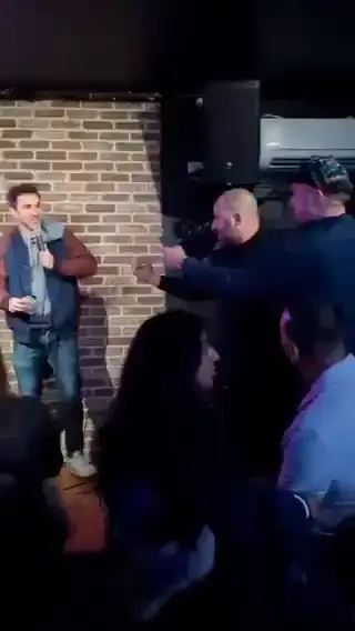 Normand was escorted off stage.