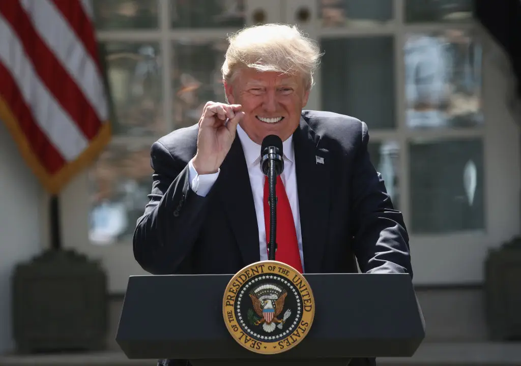 President Donald Trump pictured in 2017 announcing his decision to pull the US out of the Paris Agreement (Win McNamee/Getty Images)