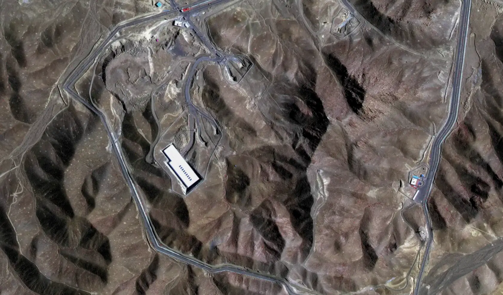 The landscape at Fordow appeared largely untouched before the attacks (Maxar Technologies)