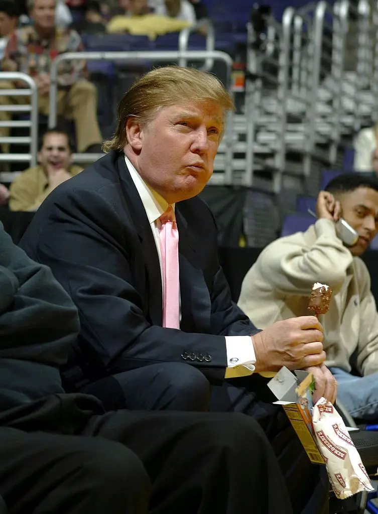 Trump eating a Ben & Jerry's ice cream at a Laker's Game in 2005 (Jeff Gross/Getty Images)